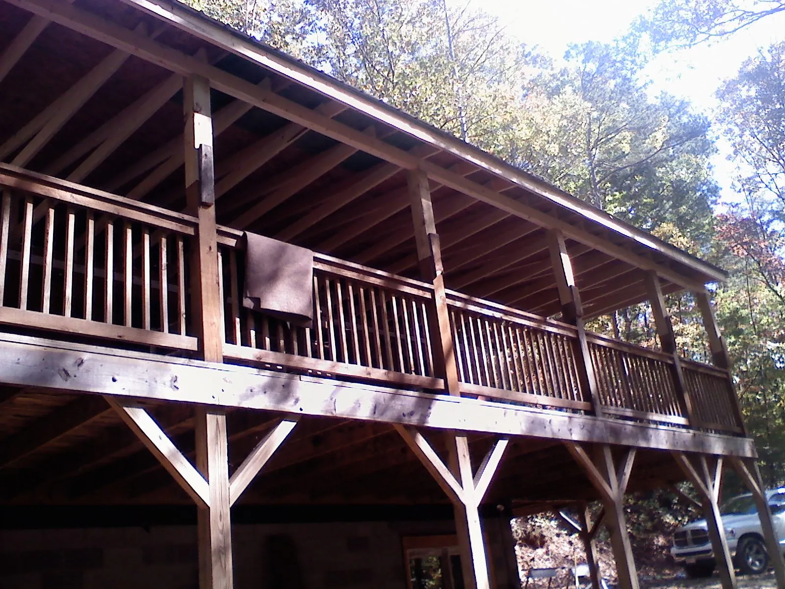 Timber framing under a new elevated porch and deck — Roof Leak Repair in Jersey City by Roofing Brothers